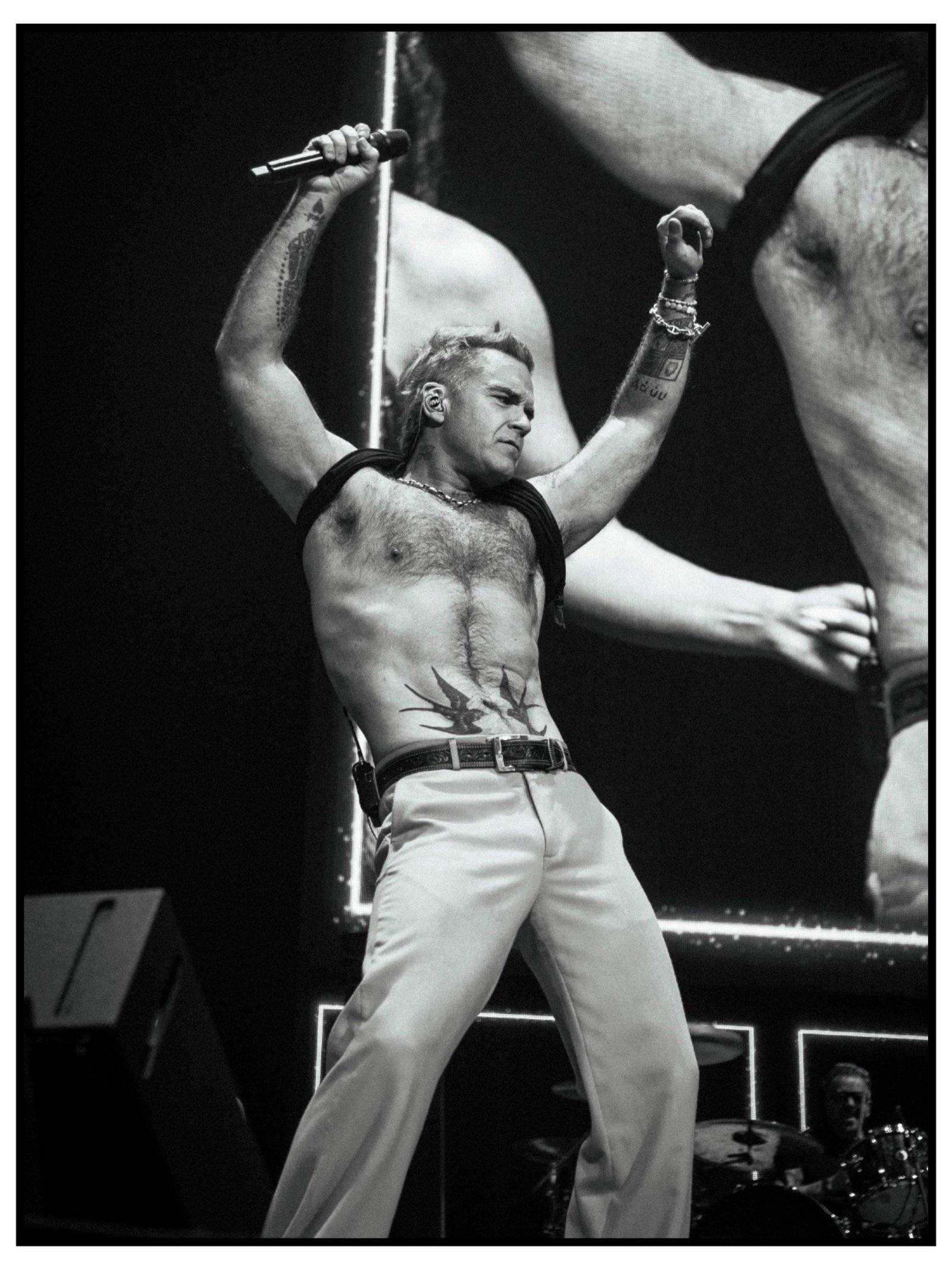 Robbie Williams promete Sexed Up e Advertising Space no show do Brasil